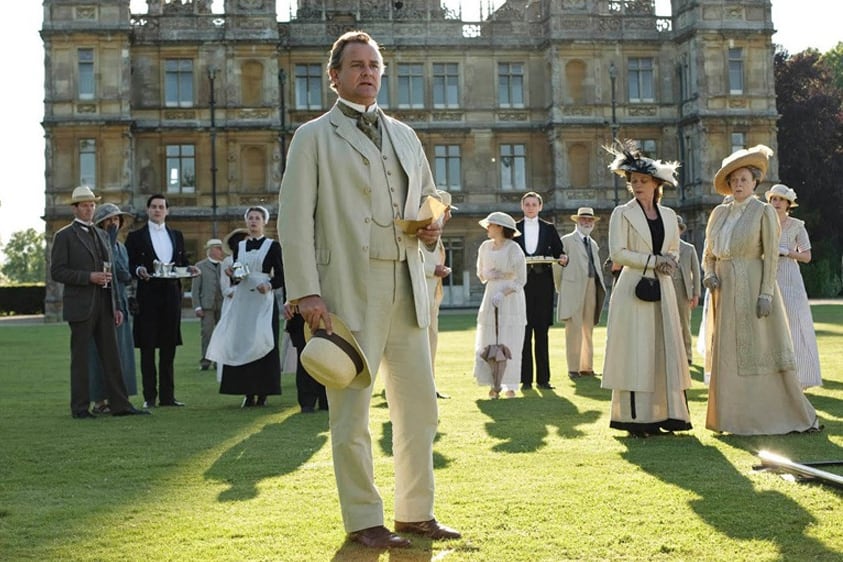 Hugh Bonneville como Robert Crawley, conde de Grantham, en la exitosa ficción Downton Abbey, rodada en el castillo Highclere.