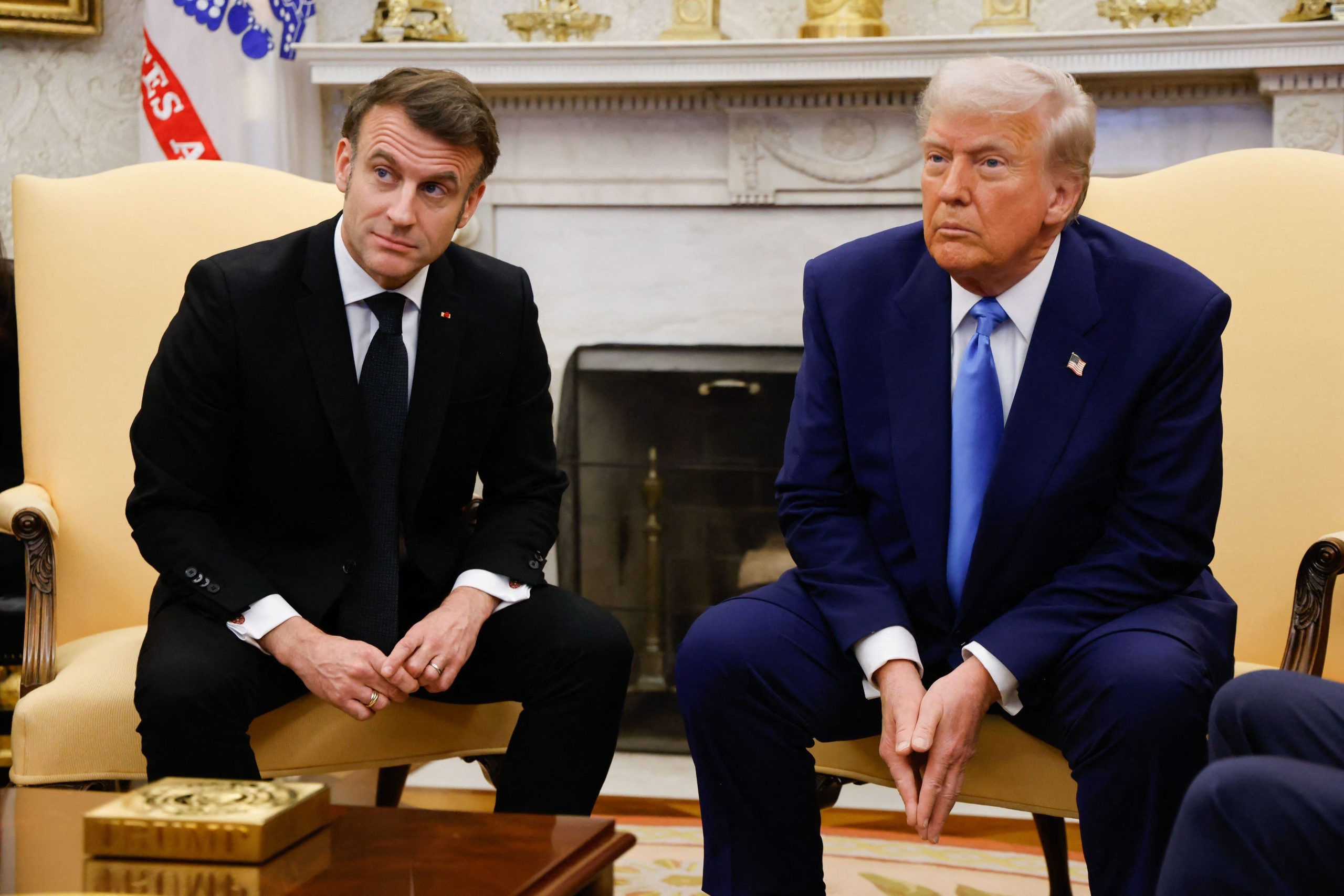 US President Donald Trump meets with French President Emmanuel Macron in the Oval Office of the White House in Washington, DC, on February 24, 2025. (Photo by Ludovic MARIN / AFP)