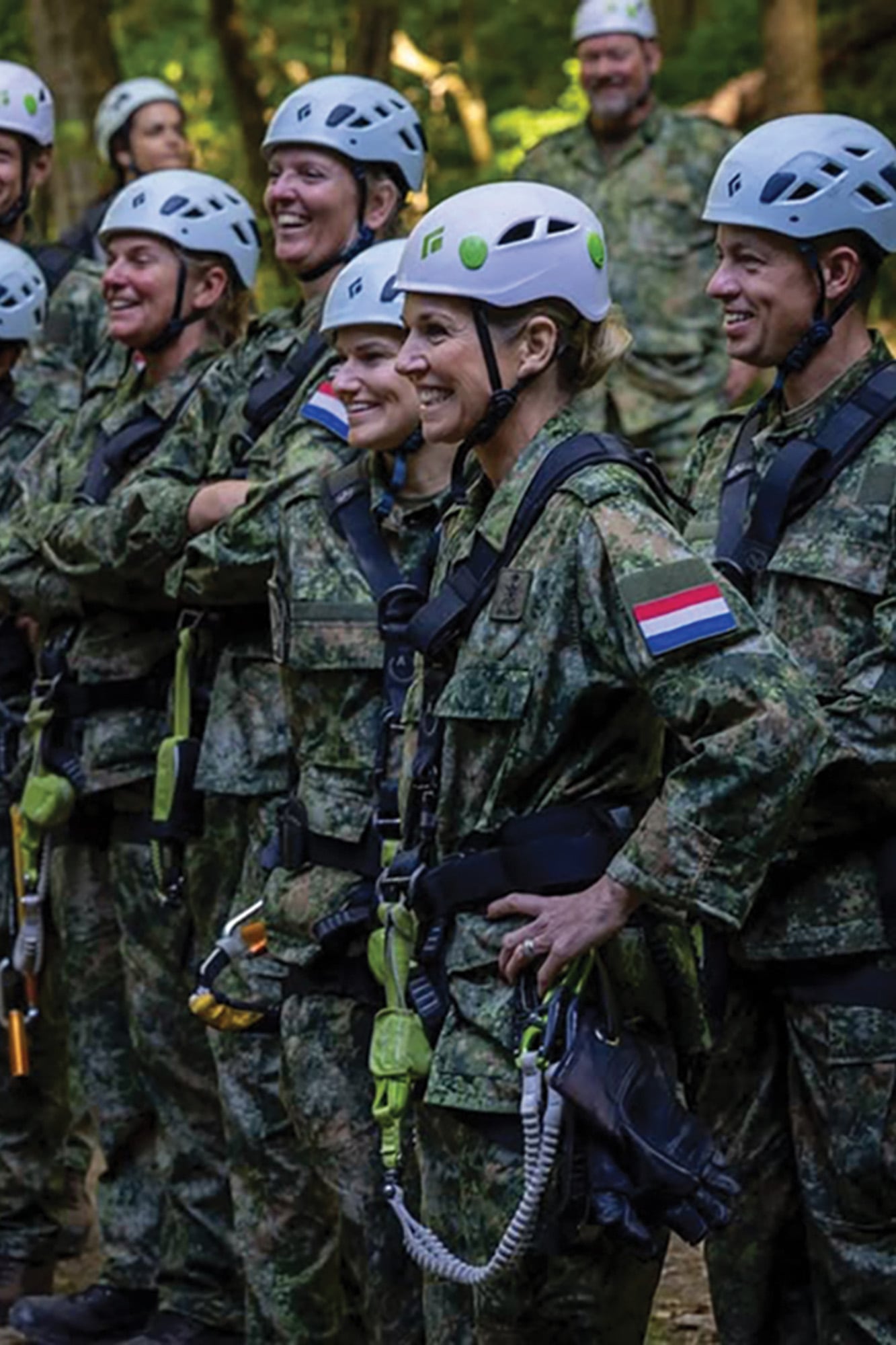La Reina y su escuadrón, todos a pura sonrisa. 