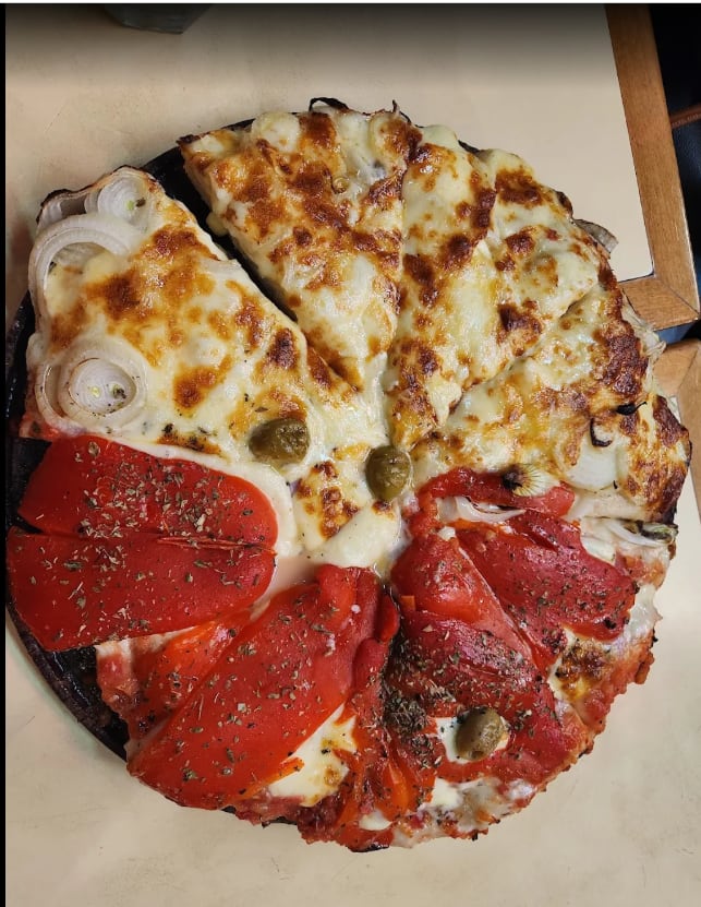 La pizza era mitad fugazzeta y mitad especial. (Foto: GoogleMaps/Gabriel Casorran)