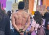 Un joven marchó con su novia por el Día de la Mujer y fue increpado por su ex: debía la manutención de su hijo
