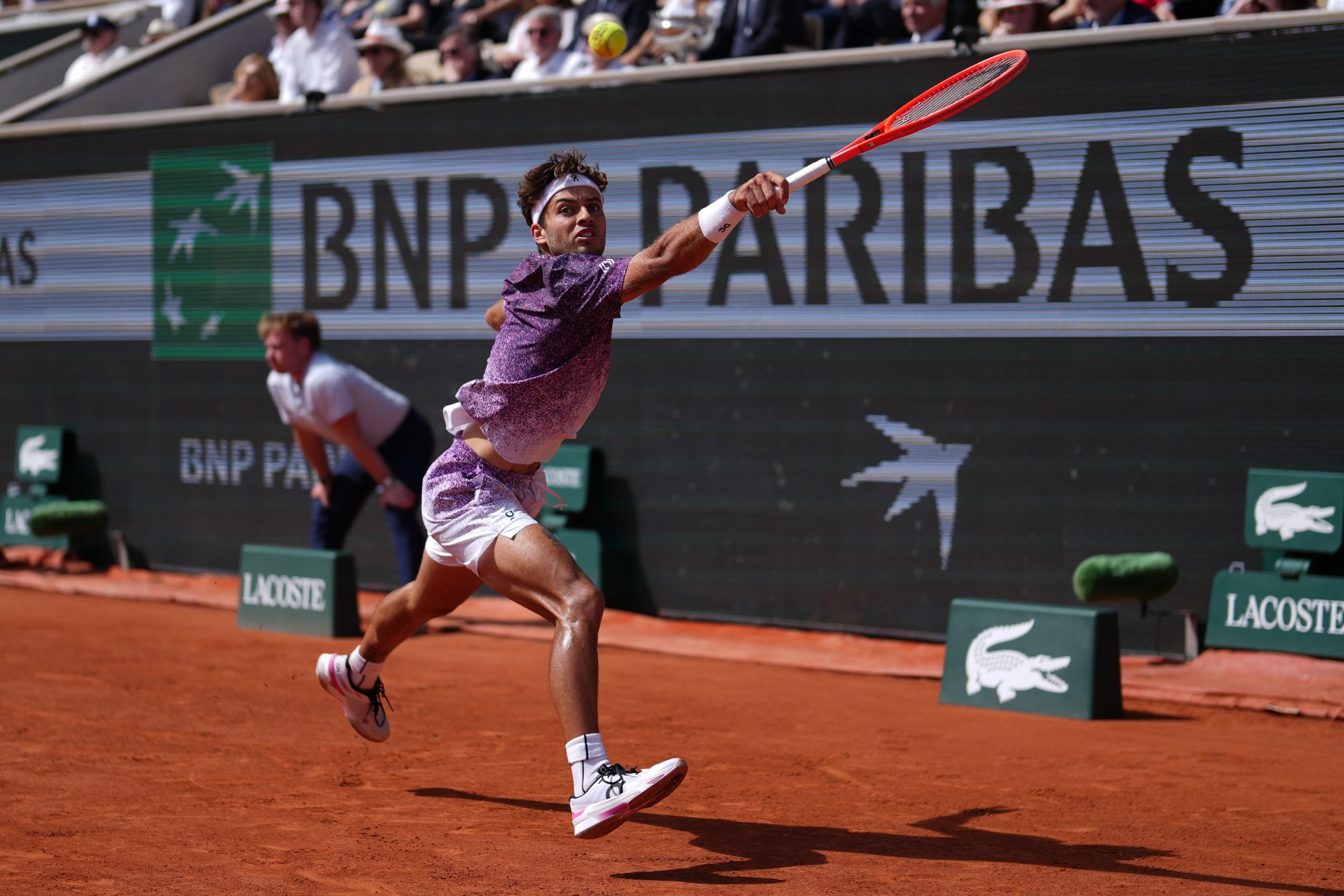 Flavio Cobolli jugando su primera final de Grand Slam
