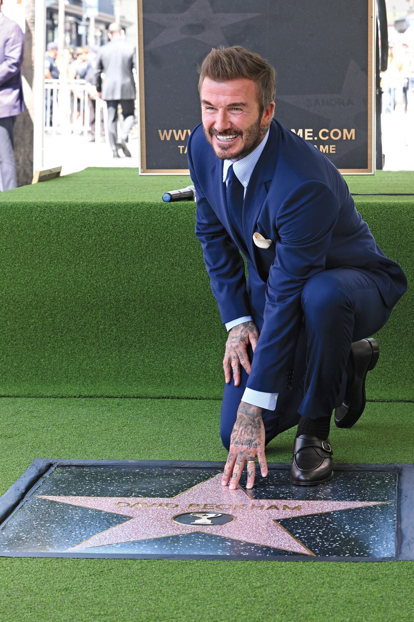 David Beckham posa sonriente con su estrella