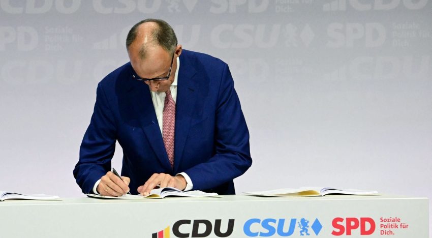 El conservador Merz firma con los socialdemócratas el acuerdo para una gran coalición en Alemania
