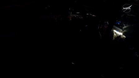 Tripulación a oscuras preparando la fotografía