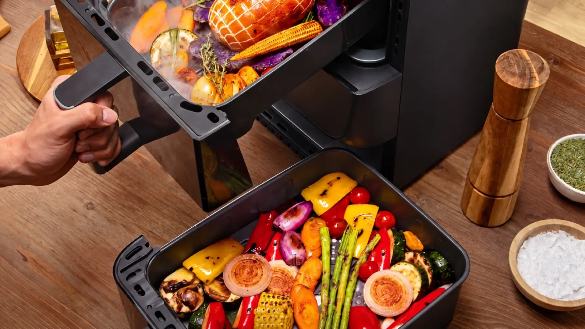 Cocina dos platos a la vez y vigílalos sin perder temperatura: la freidora de Cecotec con doble ventana