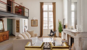 Esta casa en Montpellier conserva el carácter de su arquitectura original y pone en valor ricos materiales y elementos